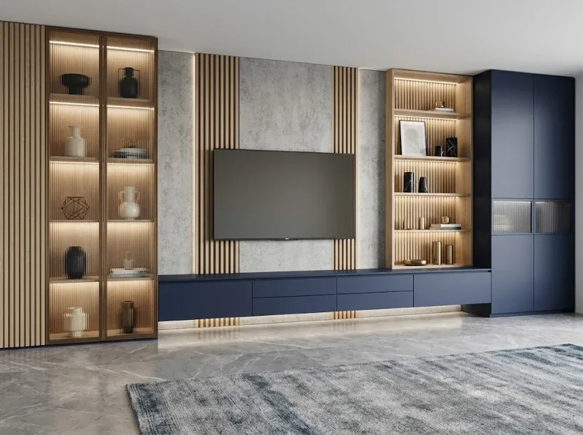 A TV unit with hidden storage wall by Reedify Modulars